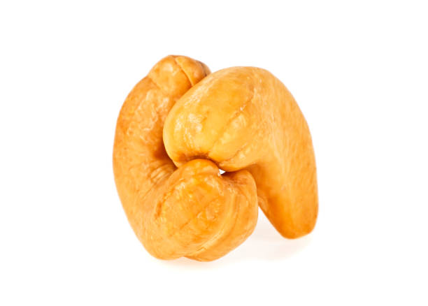istock Roasted cashew nuts isolated on a white background, close up 925160012