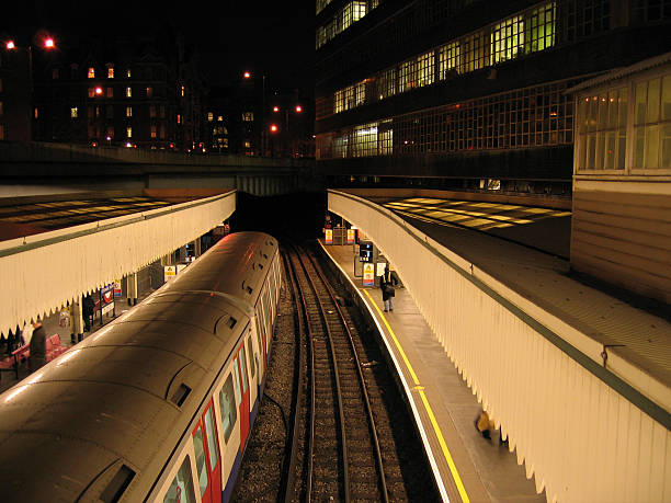 People on escalators in London Underground.
