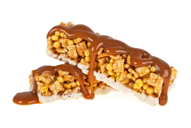 istock Two energy bar in caramel isolated on a white background 925164428
