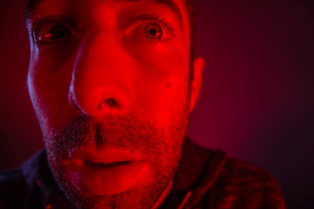 istock Man with shocked facial expression looking a side 925164672