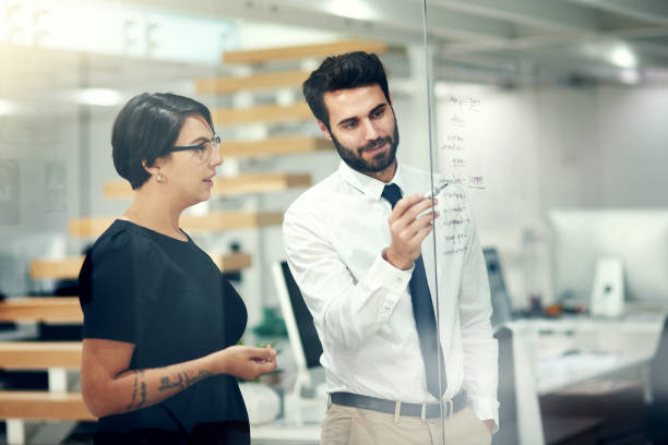 istock Putting up a new plan on the wall 925167958