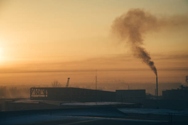 istock Industrial buildings in the sunrise. 925171178
