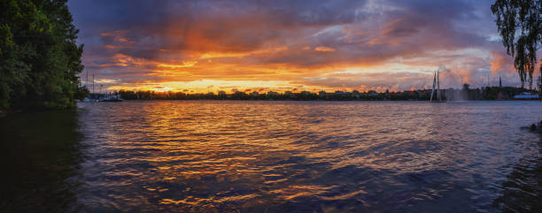 istock panorama over a seaside with sunset in the background 925172532