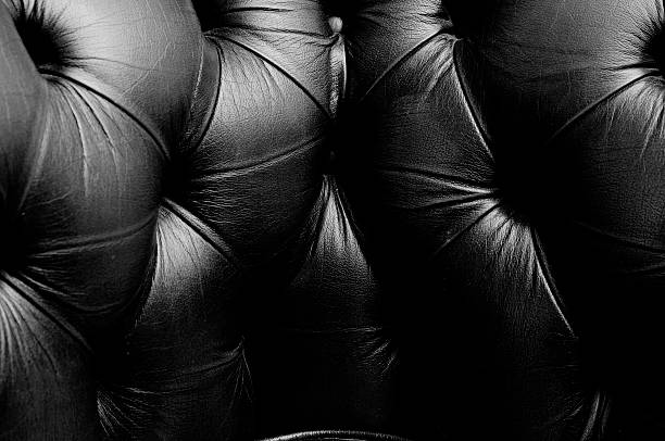 istock abstract background aged leather couch skin black & white 92517286