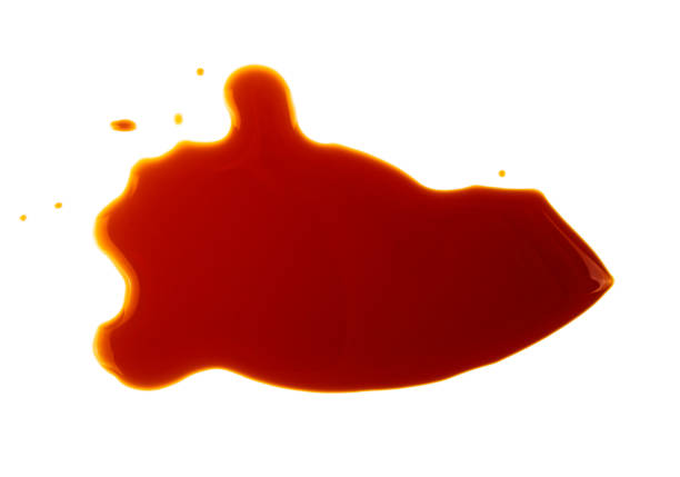 istock Puddle of soy sauce isolated on a white background 925172868