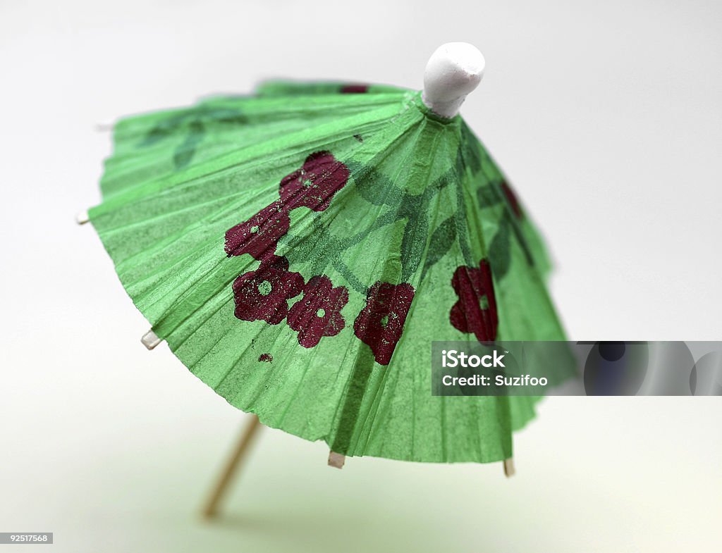 cocktail umbrella, green  Close-up Stock Photo