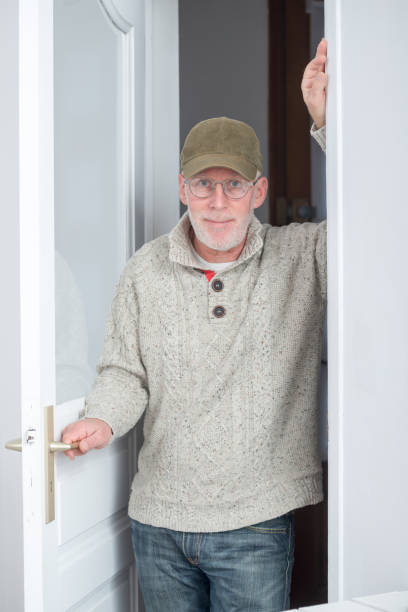 istock portrait of handsome mature man with a cap 925184568
