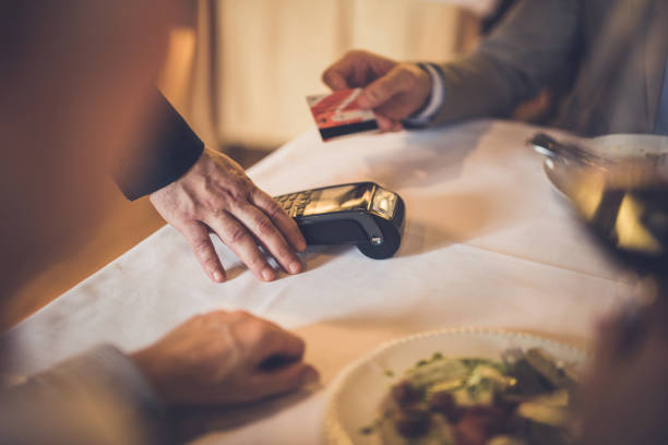 istock Paying a bill in a restaurant with credit card! 925188652
