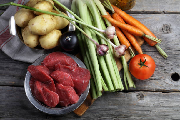 Beef, celery, carrots, potatoes, pepper, tomato and garlic