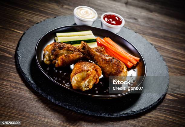 Roast Chicken Drumsticks With Baked Potatoes Stock Photo - Download Image Now - Dieting, Healthy Eating, Horizontal