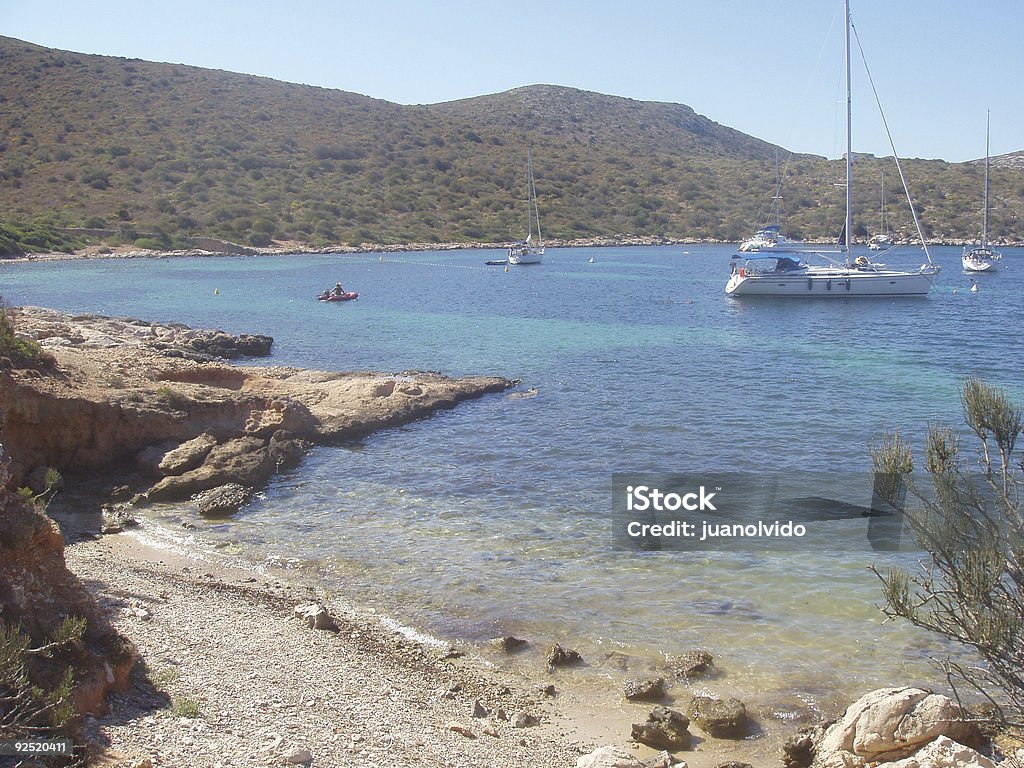 beach, sea and ship in island  Balearic Islands Stock Photo