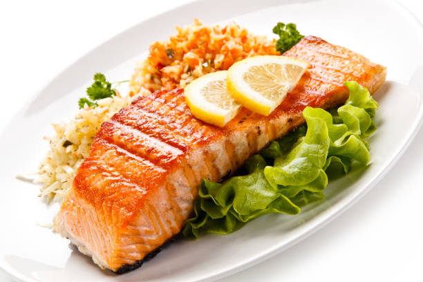istock Fish dish - grilled salmon and vegetable salad 925205968