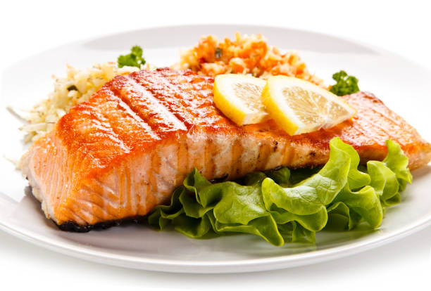 istock Fish dish - grilled salmon and vegetable salad 925206034