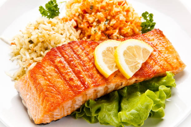 istock Fish dish - grilled salmon and vegetable salad 925206242