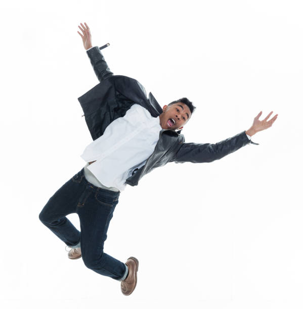 istock Daring young handsome male in mid air falling and jumping 925211938