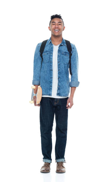 istock Attractive young male holding a skateboard 925212428