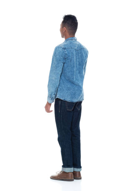 istock Handsome young male with hands by his side 925218314