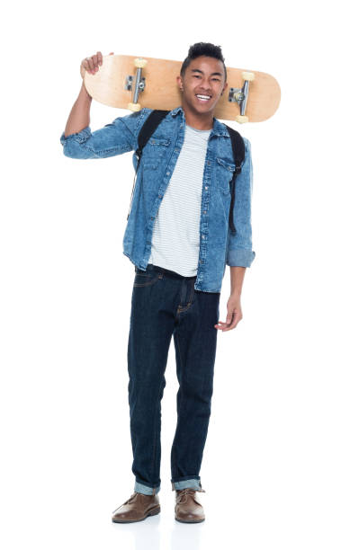 istock Attractive young male holding a skateboard 925219288