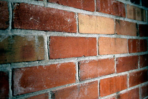 Wall of bricks small DOF stock photo