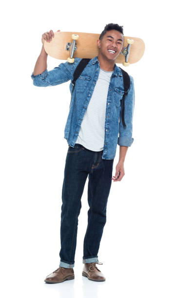 istock Attractive young male holding a skateboard 925219620