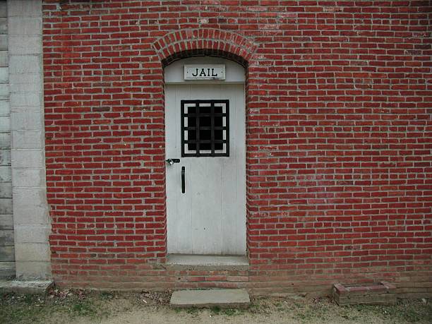 istock Door with sign above saying Jail 92522161