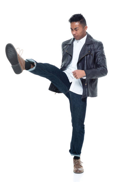 istock Handsome attractive young male kicking 925222444