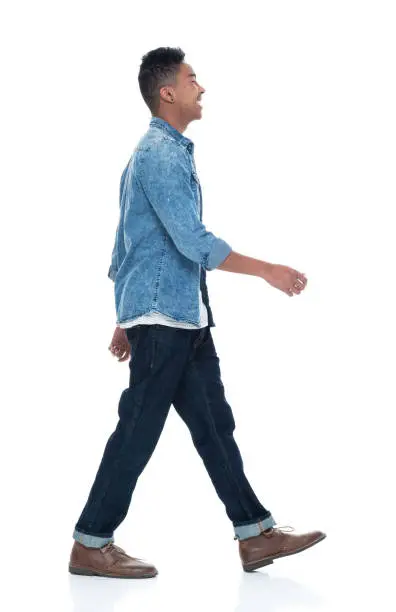 Photo of Handsome young male walking