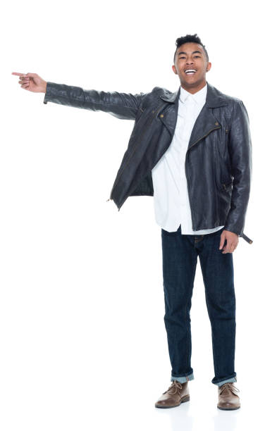 istock Handsome attractive young male pointing and presenting 925224484