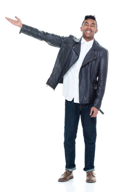 istock Handsome attractive young male pointing and presenting 925224486