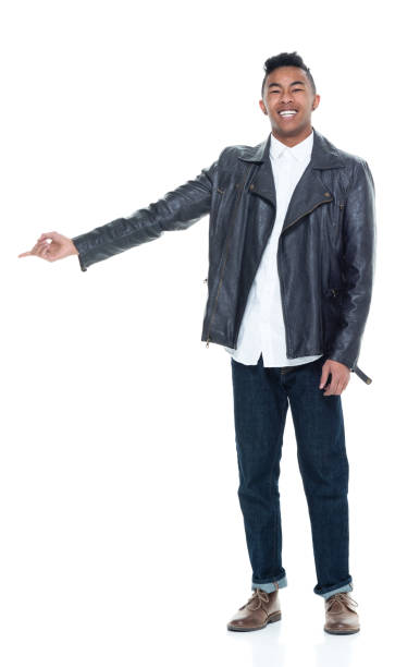 istock Handsome attractive young male pointing and presenting 925224600