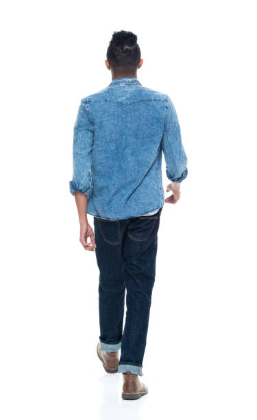 istock Handsome young male walking 925225390