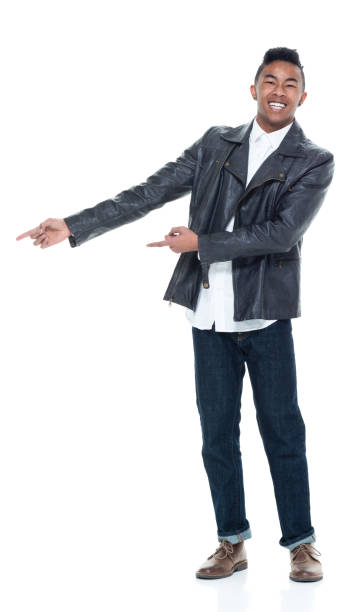 istock Handsome attractive young male pointing and presenting 925225680