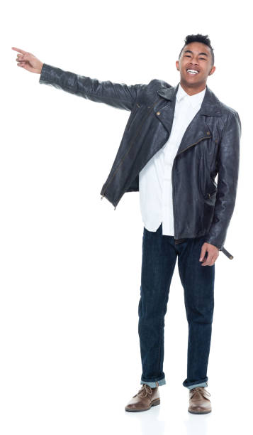 istock Handsome attractive young male pointing and presenting 925225700