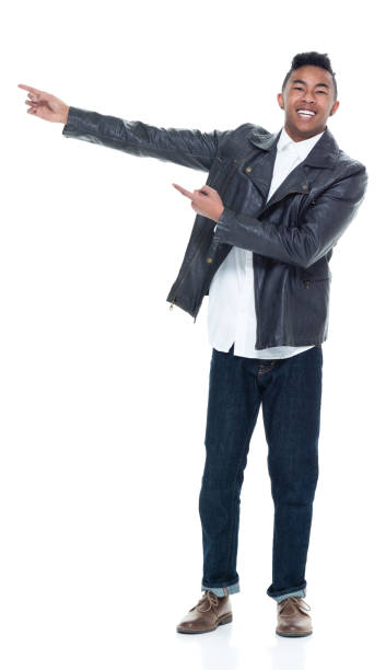 istock Handsome attractive young male pointing and presenting 925225758