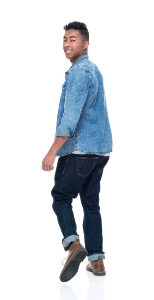 istock Handsome young male looking over shoulder 925226106