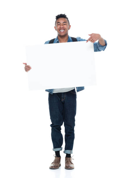 istock Handsome young male holding placard 925226464
