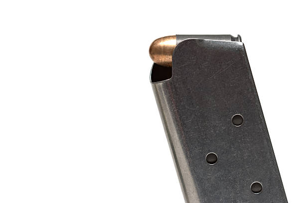 bullet in clip bullet in magazine over white - military-issued springfield 1911-a1. springfield new jersey stock pictures, royalty-free photos & images