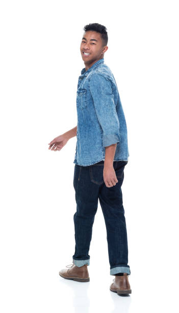 istock Handsome young male looking over shoulder 925230826