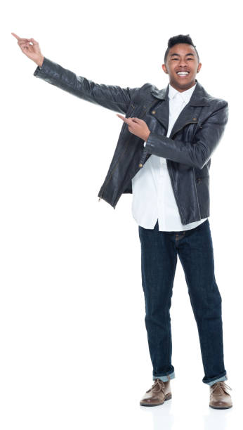 istock Handsome attractive young male pointing and presenting 925230928