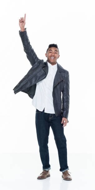 istock Handsome attractive young male pointing and presenting 925232016