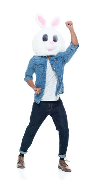 istock Hip young male wearing a bunny mask 925232634