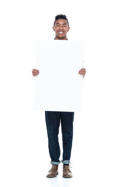 istock Handsome young male holding placard 925232958