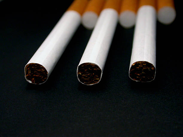 istock a set of three cigarettes spaced out 92523478
