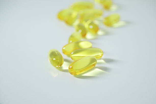 yellow pills stock photo