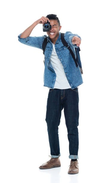 istock Handsome young male photographer with a camera 925235542