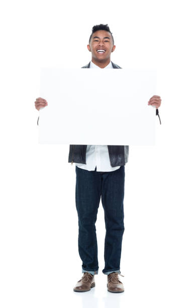 istock Dashing young man holding a placard 925235840