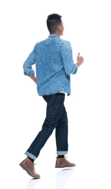 istock Handsome young male running 925235858