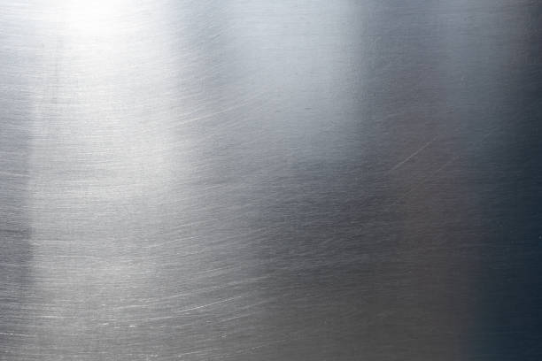 A surface of a well used stainless table