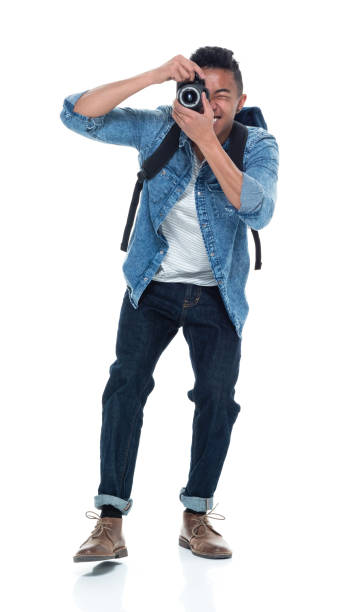 istock Handsome young male photographer with a camera 925236304