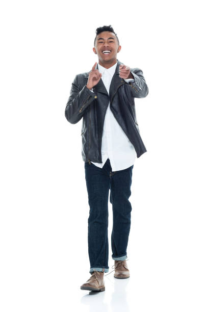 istock Good looking young man walking and pointing 925236810
